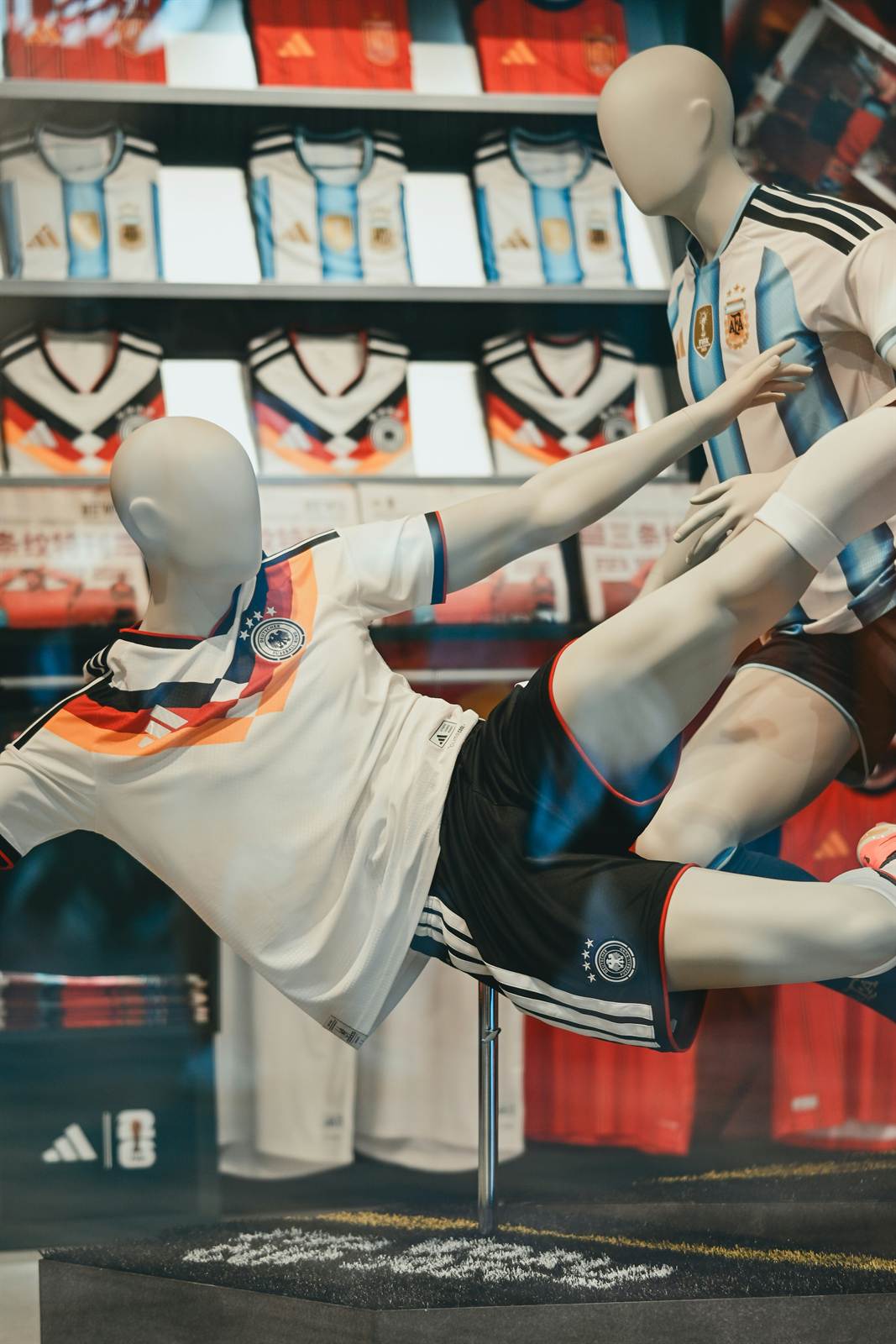 National team jerseys displayed on mannequins